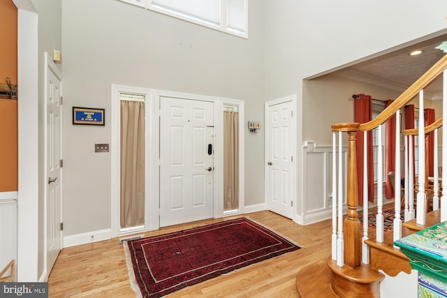 8 Lochwell Ct, Baltimore, MD 21234 - foyer entrance featuring wood finished floors, a high ceiling, recessed lighting, and baseboards