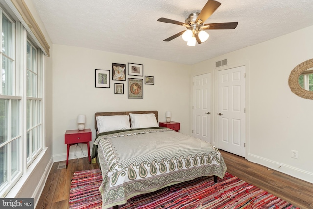 8 Lochwell Ct, Baltimore, MD 21234 - bedroom with wood finished floors, baseboards, a textured ceiling, and a ceiling fan