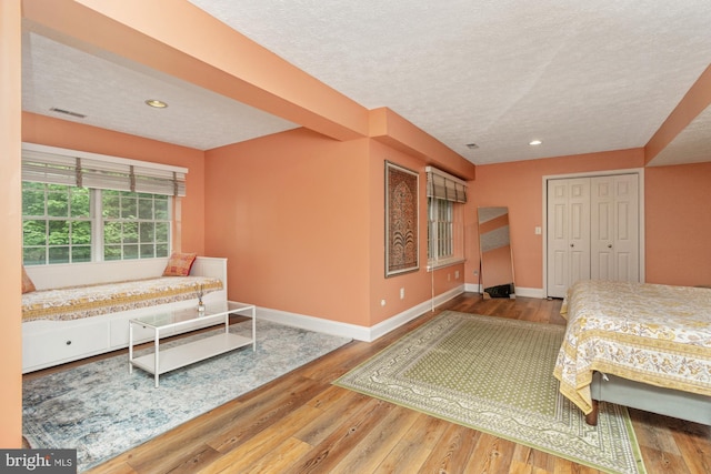 8 Lochwell Ct, Baltimore, MD 21234 - bedroom featuring baseboards, a textured ceiling, wood finished floors, and recessed lighting