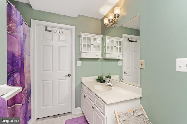 8 Lochwell Ct, Baltimore, MD 21234 - bathroom featuring vanity, tile patterned floors, a shower with curtain, and baseboards