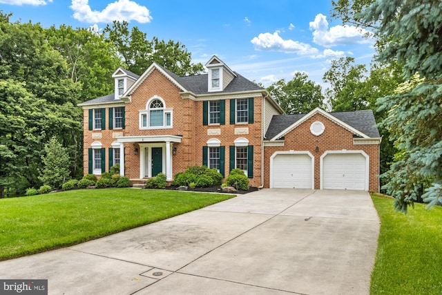 8 Lochwell Ct, Baltimore, MD 21234 - colonial-style house with an attached garage, driveway, brick siding, and a front lawn