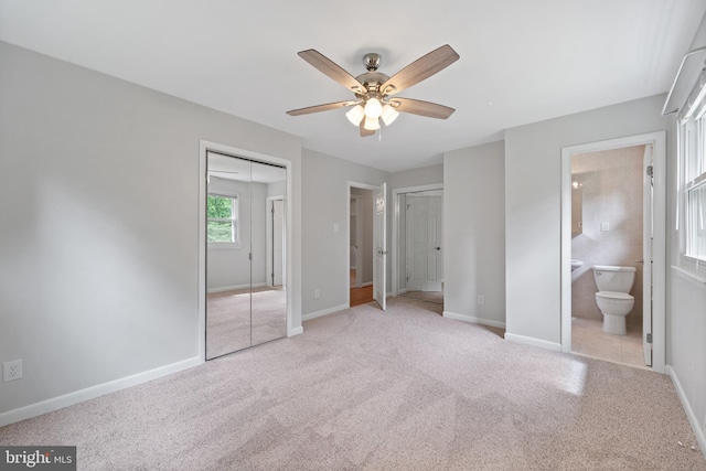 13712 S Springfield Rd, Brandywine, MD 20613 - unfurnished bedroom with carpet flooring, baseboards, multiple closets, and ensuite bathroom