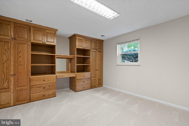 13712 S Springfield Rd, Brandywine, MD 20613 - unfurnished bedroom with a textured ceiling, light colored carpet, and baseboards