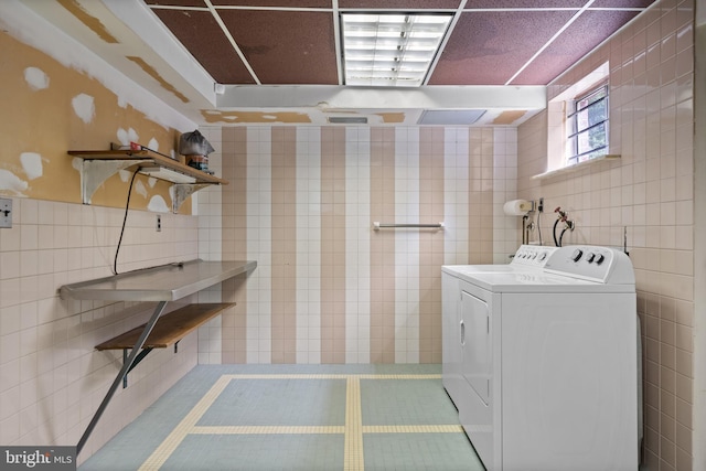 13712 S Springfield Rd, Brandywine, MD 20613 - washroom featuring independent washer and dryer and tile walls