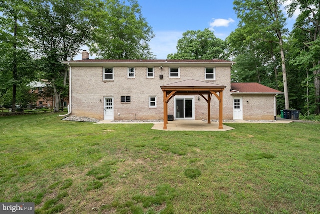 13712 S Springfield Rd, Brandywine, MD 20613 - rear view of property with a gazebo, a patio, a chimney, and a lawn