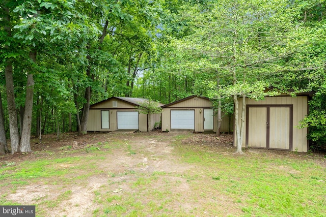 13712 S Springfield Rd, Brandywine, MD 20613 - view of yard featuring an outdoor structure and a garage