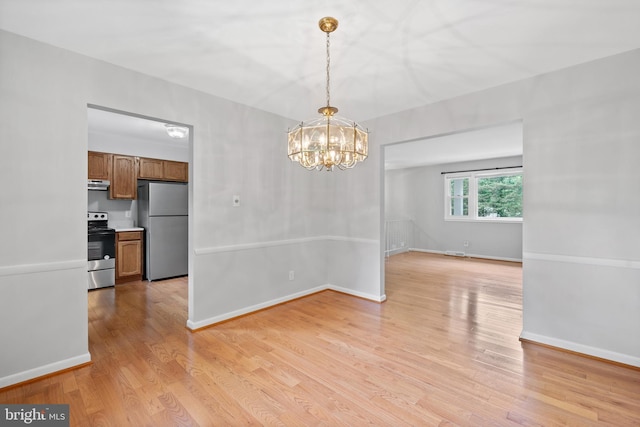13712 S Springfield Rd, Brandywine, MD 20613 - unfurnished dining area featuring a chandelier, light wood finished floors, and baseboards