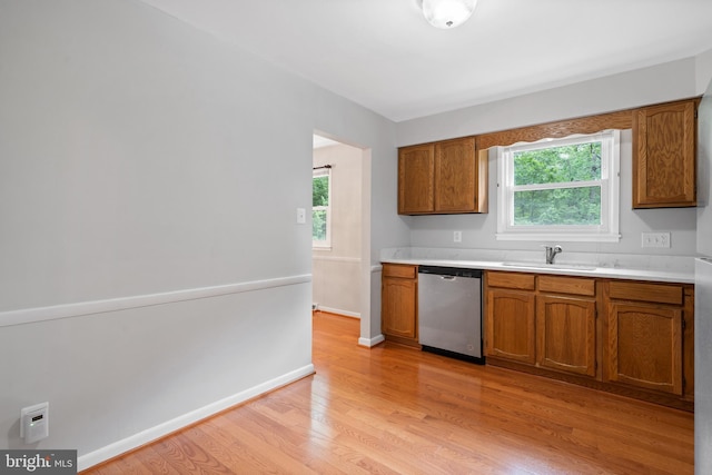 13712 S Springfield Rd, Brandywine, MD 20613 - kitchen featuring dishwasher, a sink, and brown cabinets