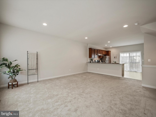 262 Norland Knoll Dr, Stephenson, VA 22656 - unfurnished living room with light carpet and recessed lighting
