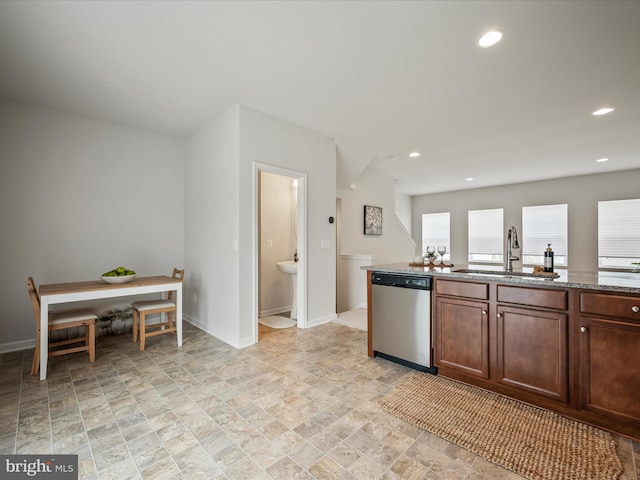 262 Norland Knoll Dr, Stephenson, VA 22656 - kitchen with stainless steel dishwasher, stone finish flooring, recessed lighting, and stone countertops