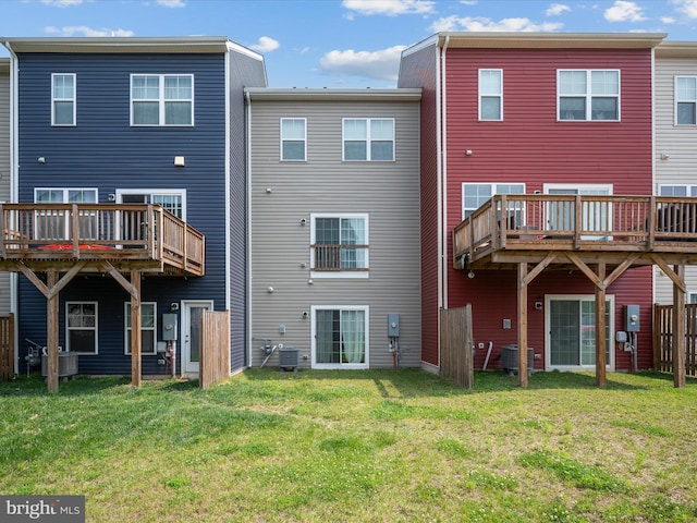 262 Norland Knoll Dr, Stephenson, VA 22656 - back of property with a lawn and a deck