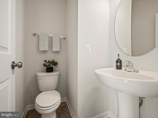 262 Norland Knoll Dr, Stephenson, VA 22656 - half bath with toilet and tile patterned floors