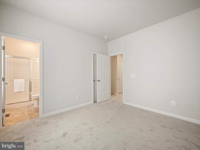 262 Norland Knoll Dr, Stephenson, VA 22656 - unfurnished bedroom featuring carpet flooring and ensuite bath