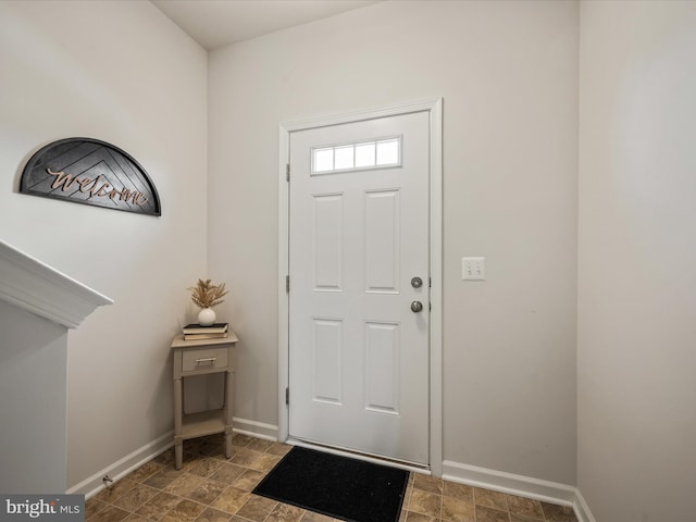 262 Norland Knoll Dr, Stephenson, VA 22656 - entryway featuring baseboards and stone finish flooring