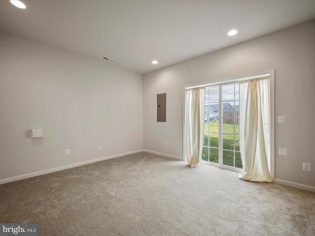 262 Norland Knoll Dr, Stephenson, VA 22656 - carpeted spare room featuring electric panel and recessed lighting