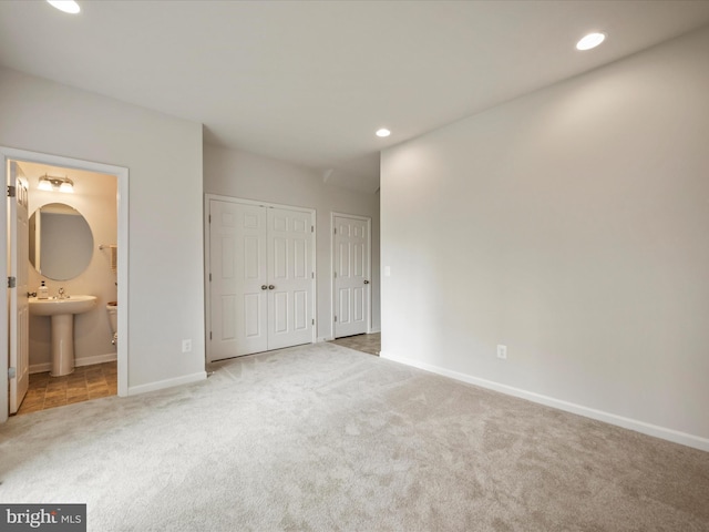 262 Norland Knoll Dr, Stephenson, VA 22656 - unfurnished bedroom with carpet, recessed lighting, ensuite bath, and multiple closets