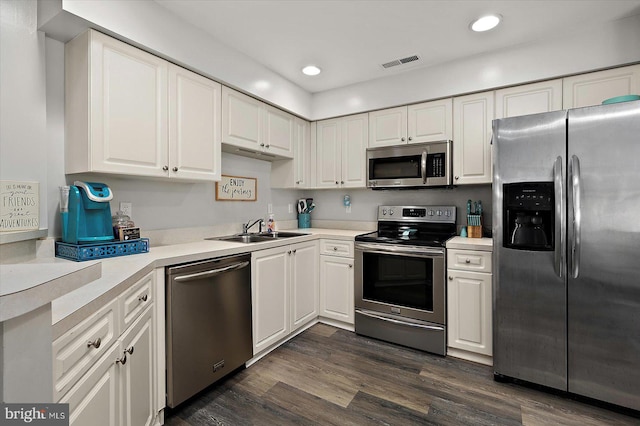 12545 River Run Ln Unit 68, Berlin, MD 21811 - kitchen with appliances with stainless steel finishes, a sink, white cabinets, recessed lighting, and light countertops