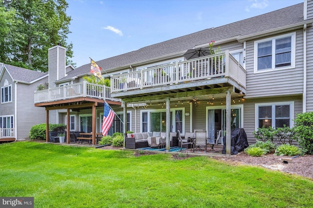 12545 River Run Ln Unit 68, Berlin, MD 21811 - back of property with an outdoor living space, a wooden deck, a lawn, a patio, and a shingled roof