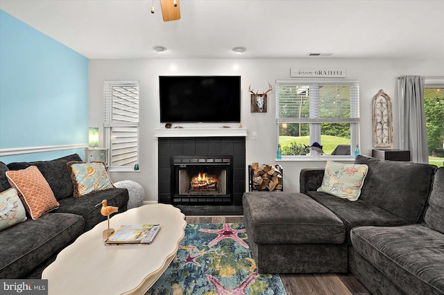 12545 River Run Ln Unit 68, Berlin, MD 21811 - living room with wood finished floors, a fireplace, and a ceiling fan