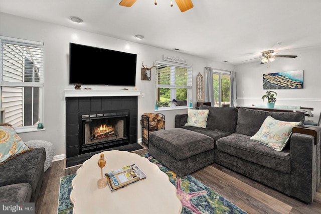 12545 River Run Ln Unit 68, Berlin, MD 21811 - living room with a ceiling fan, wood finished floors, and a tiled fireplace
