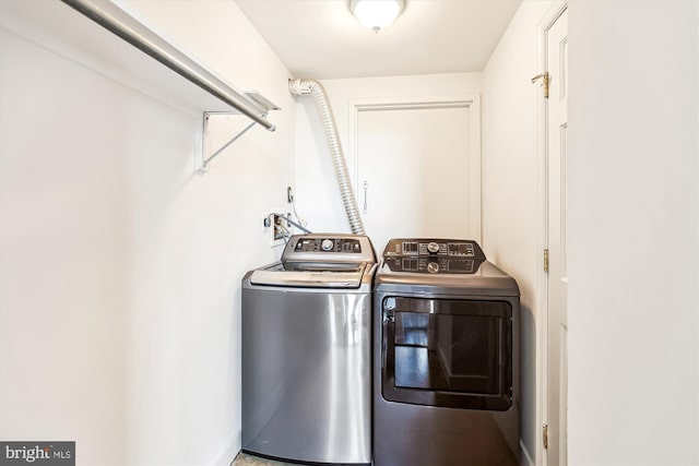955 26th St NW Unit 512, Washington, DC 20037 - laundry room featuring separate washer and dryer