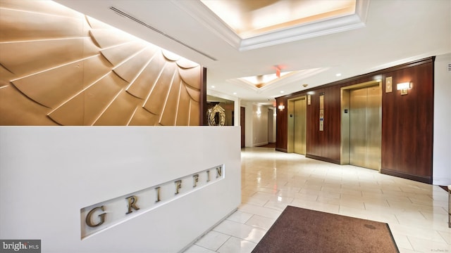 955 26th St NW Unit 512, Washington, DC 20037 - hall with elevator, a raised ceiling, and ornamental molding