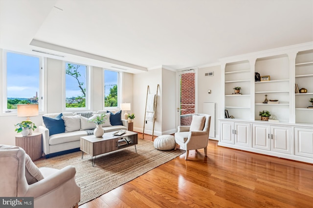 955 26th St NW Unit 512, Washington, DC 20037 - living area featuring light wood-style floors and baseboards