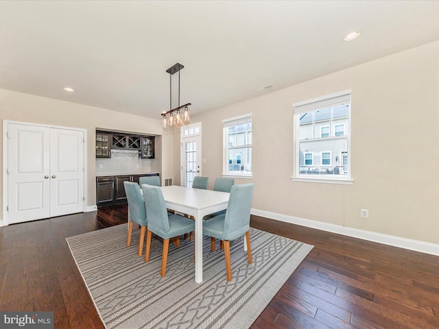 7114 Proclamation Pl, Frederick, MD 21703 - dining space featuring dark wood-type flooring, healthy amount of natural light, baseboards, recessed lighting, and a chandelier