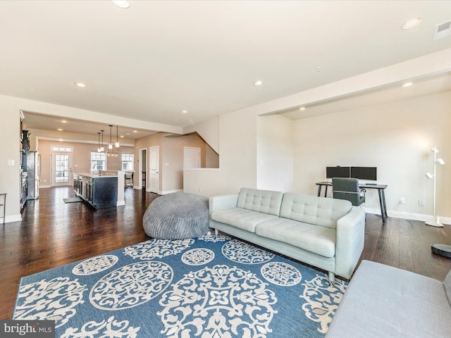 7114 Proclamation Pl, Frederick, MD 21703 - living room featuring dark wood-type flooring, recessed lighting, and baseboards