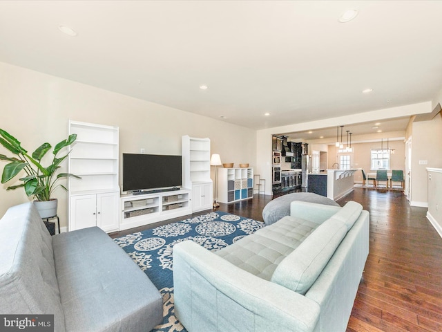 7114 Proclamation Pl, Frederick, MD 21703 - living room featuring wood finished floors, recessed lighting, and baseboards