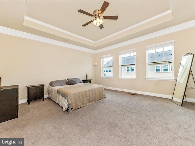 7114 Proclamation Pl, Frederick, MD 21703 - carpeted bedroom featuring a raised ceiling, crown molding, baseboards, and ceiling fan