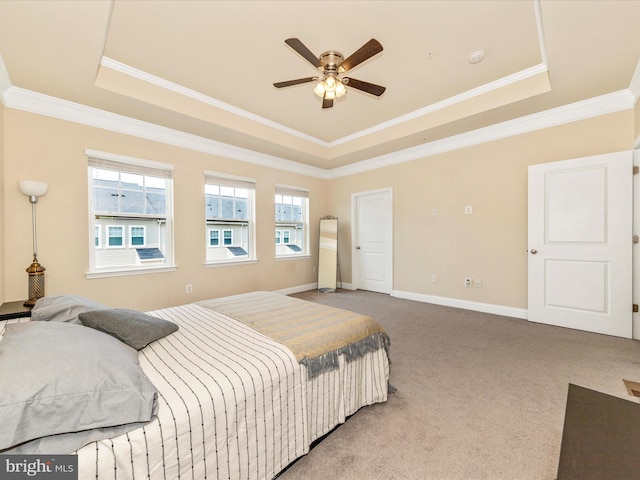 7114 Proclamation Pl, Frederick, MD 21703 - carpeted bedroom with a tray ceiling, crown molding, and baseboards