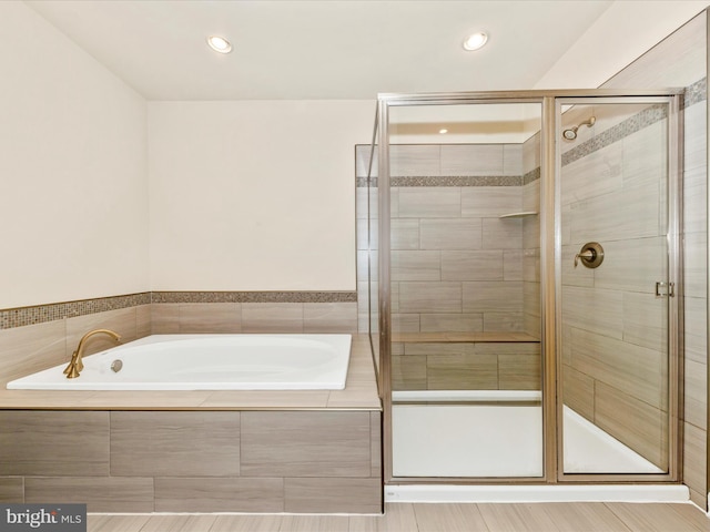 7114 Proclamation Pl, Frederick, MD 21703 - full bath with a stall shower, a garden tub, and recessed lighting