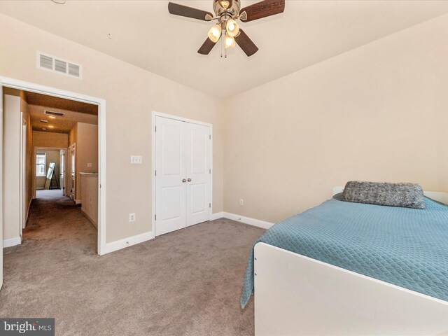 7114 Proclamation Pl, Frederick, MD 21703 - carpeted bedroom with baseboards, a closet, and a ceiling fan