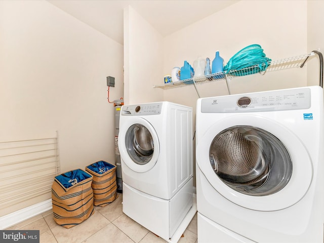 7114 Proclamation Pl, Frederick, MD 21703 - washroom featuring light tile patterned floors, independent washer and dryer, and water heater