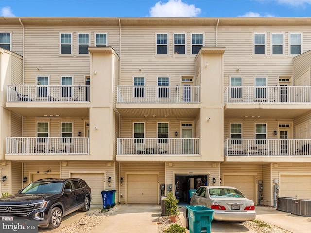 7114 Proclamation Pl, Frederick, MD 21703 - view of property with a garage, driveway, and cooling unit
