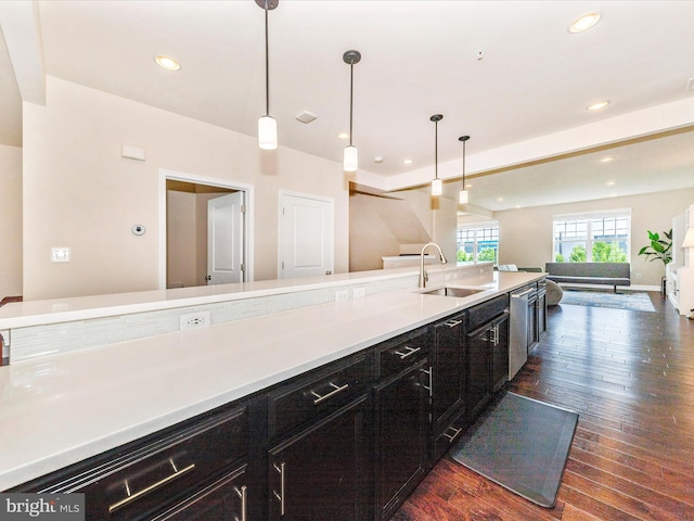 7114 Proclamation Pl, Frederick, MD 21703 - kitchen featuring a sink, open floor plan, light countertops, recessed lighting, and dark wood finished floors