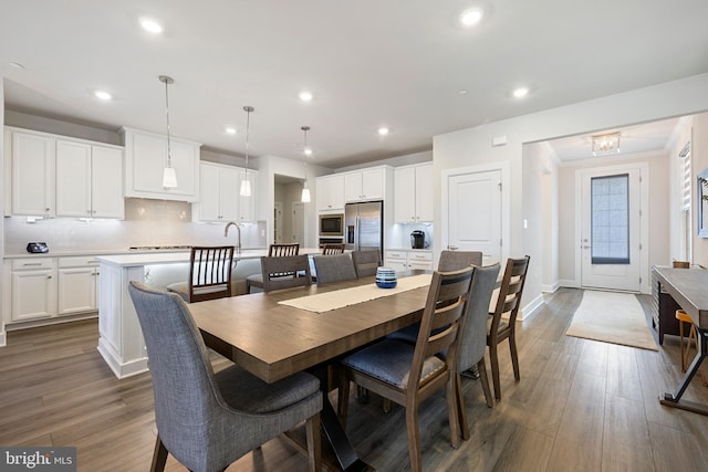 2954 Caraway Dr, Frederick, MD 21704 - dining area with recessed lighting, wood finished floors, baseboards, and ornamental molding