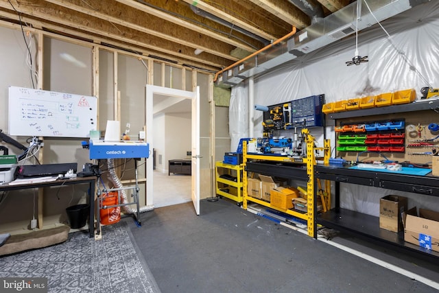 2954 Caraway Dr, Frederick, MD 21704 - unfinished basement with a workshop area