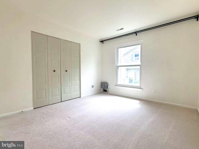 20072 Appledowre Cir Unit 237, Germantown, MD 20876 - unfurnished bedroom featuring carpet floors, a closet, and baseboards