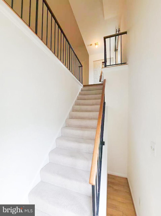 20072 Appledowre Cir Unit 237, Germantown, MD 20876 - staircase with wood finished floors