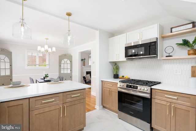 517 Worcester, Towson, MD 21286 - kitchen with appliances with stainless steel finishes, open shelves, a chandelier, and light countertops