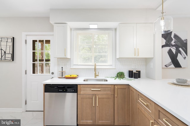 517 Worcester, Towson, MD 21286 - kitchen with dishwasher, a sink, light countertops, white cabinets, and hanging light fixtures