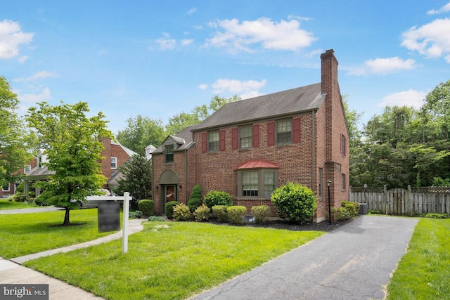 517 Worcester, Towson, MD 21286 - view of front of property with brick siding, a chimney, and central air condition unit