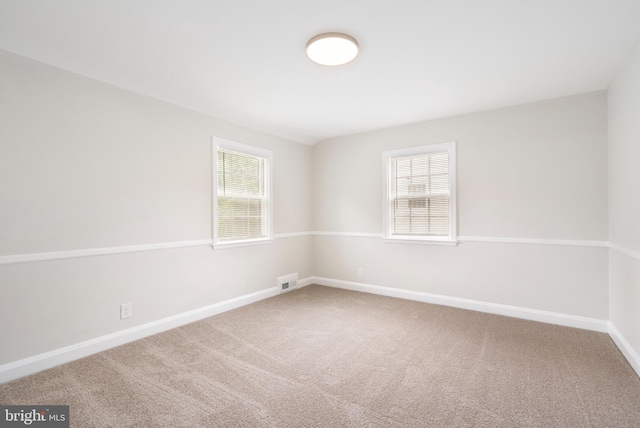 517 Worcester, Towson, MD 21286 - carpeted spare room featuring baseboards