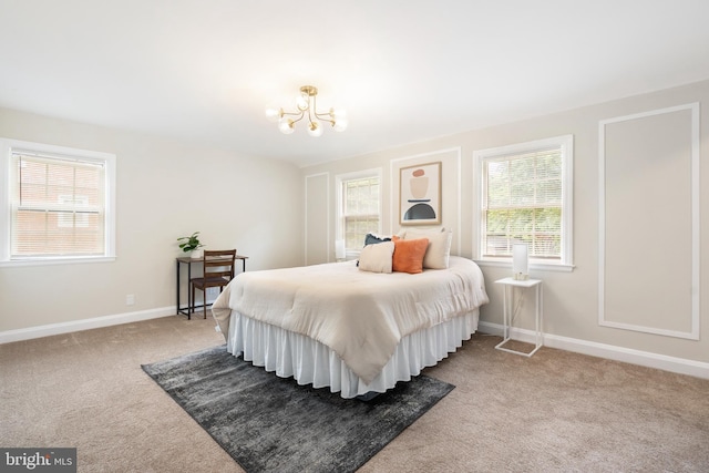 517 Worcester, Towson, MD 21286 - bedroom featuring carpet, a chandelier, and baseboards