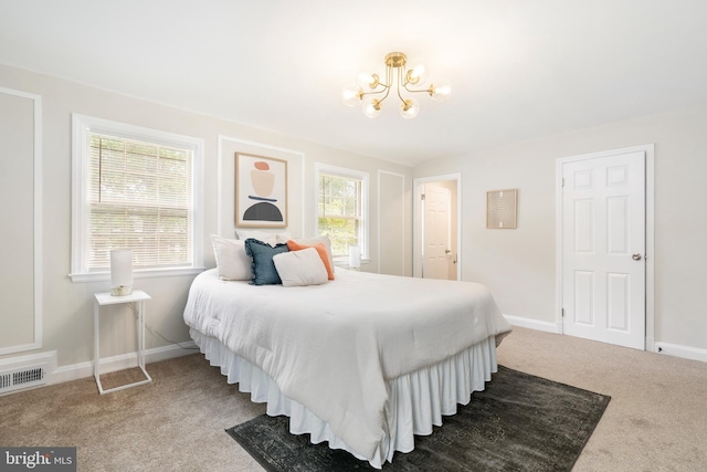 517 Worcester, Towson, MD 21286 - bedroom featuring carpet floors, a chandelier, and multiple windows