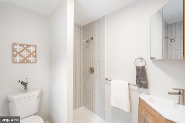 517 Worcester, Towson, MD 21286 - full bathroom featuring toilet, vanity, and a tile shower