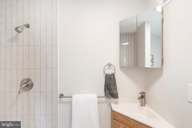 517 Worcester, Towson, MD 21286 - bathroom with a tile shower and vanity