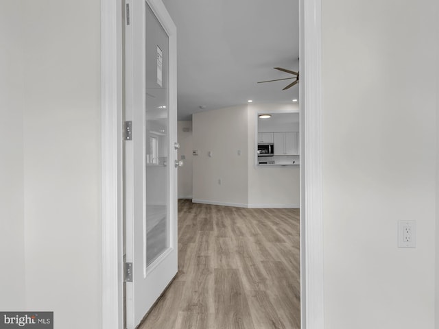 28 Sycamore Rd Unit 45, Manahawkin, NJ 08050 - hallway featuring baseboards, recessed lighting, and light wood-type flooring